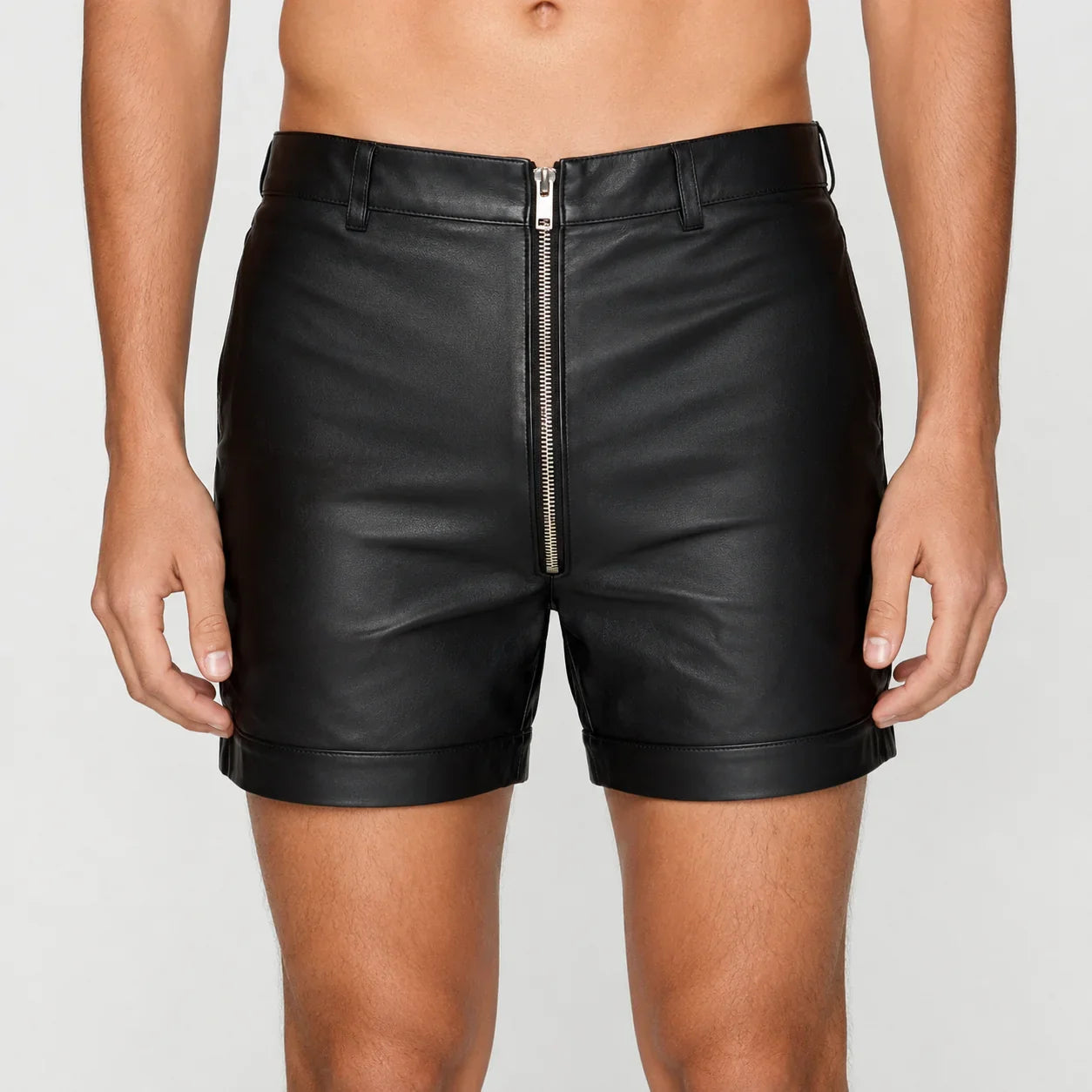 Men's black genuine leather shorts with front zipper and belt loops