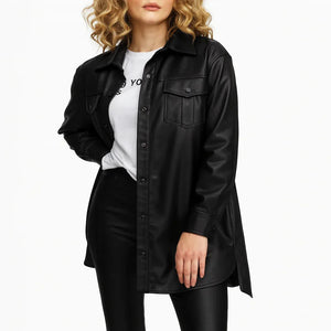 Women's black leather shirt jacket with front pockets, paired with leather pants