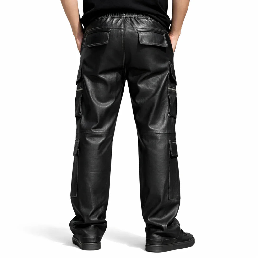 Back view of black lambskin leather cargo pants with multiple pockets, worn by a male model.