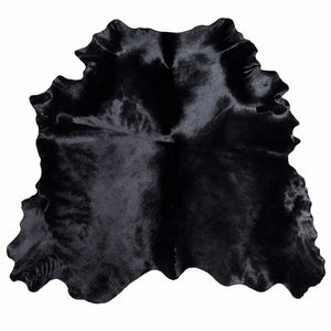 Black genuine cowhide rug with natural shape and glossy leather texture